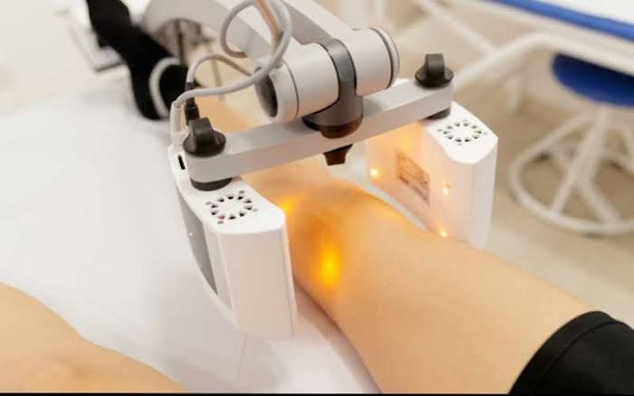 Therapist applying acupressure thumb pressure on patient acupoints